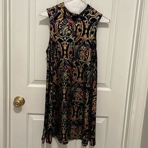 EUC size medium dress by Cherish. Mock neck, sleeveless. Multicolor foil print.